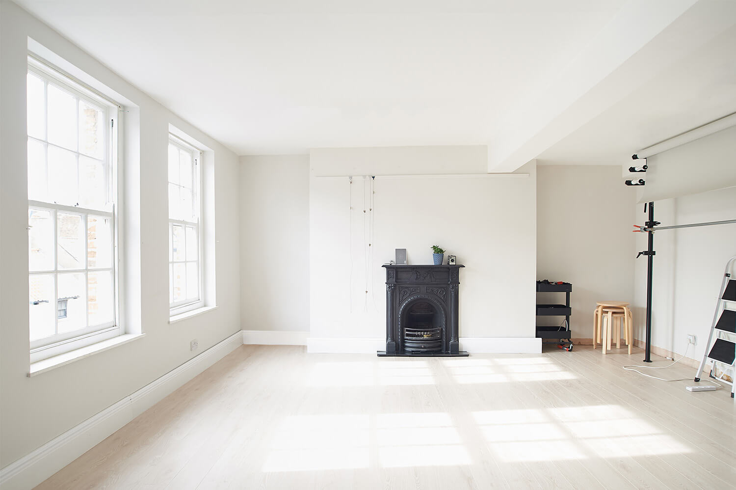 Product photography studio showing the fireplace, sash windows, background system