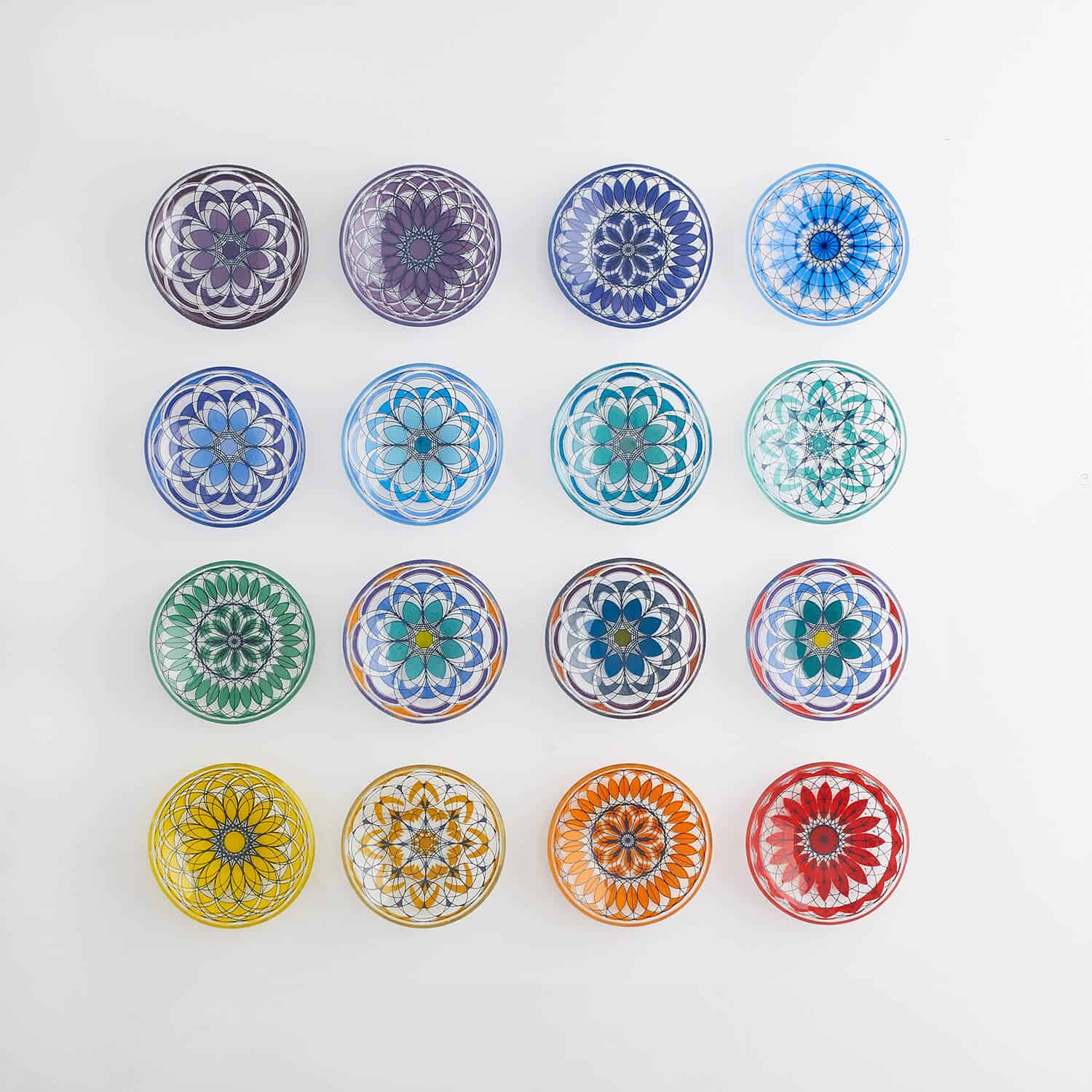 Geometric patterned glass bowls photographed in a symmetrical way